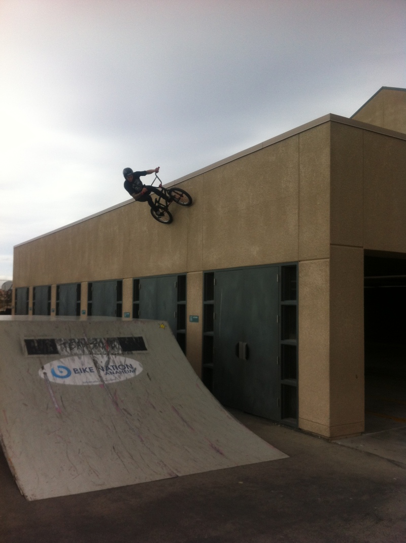 Going huge and keeping it fresh Team Soil rider Chris Hughes rides a vertical wall.